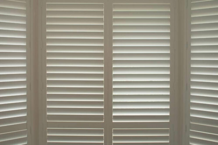 white faux shutters